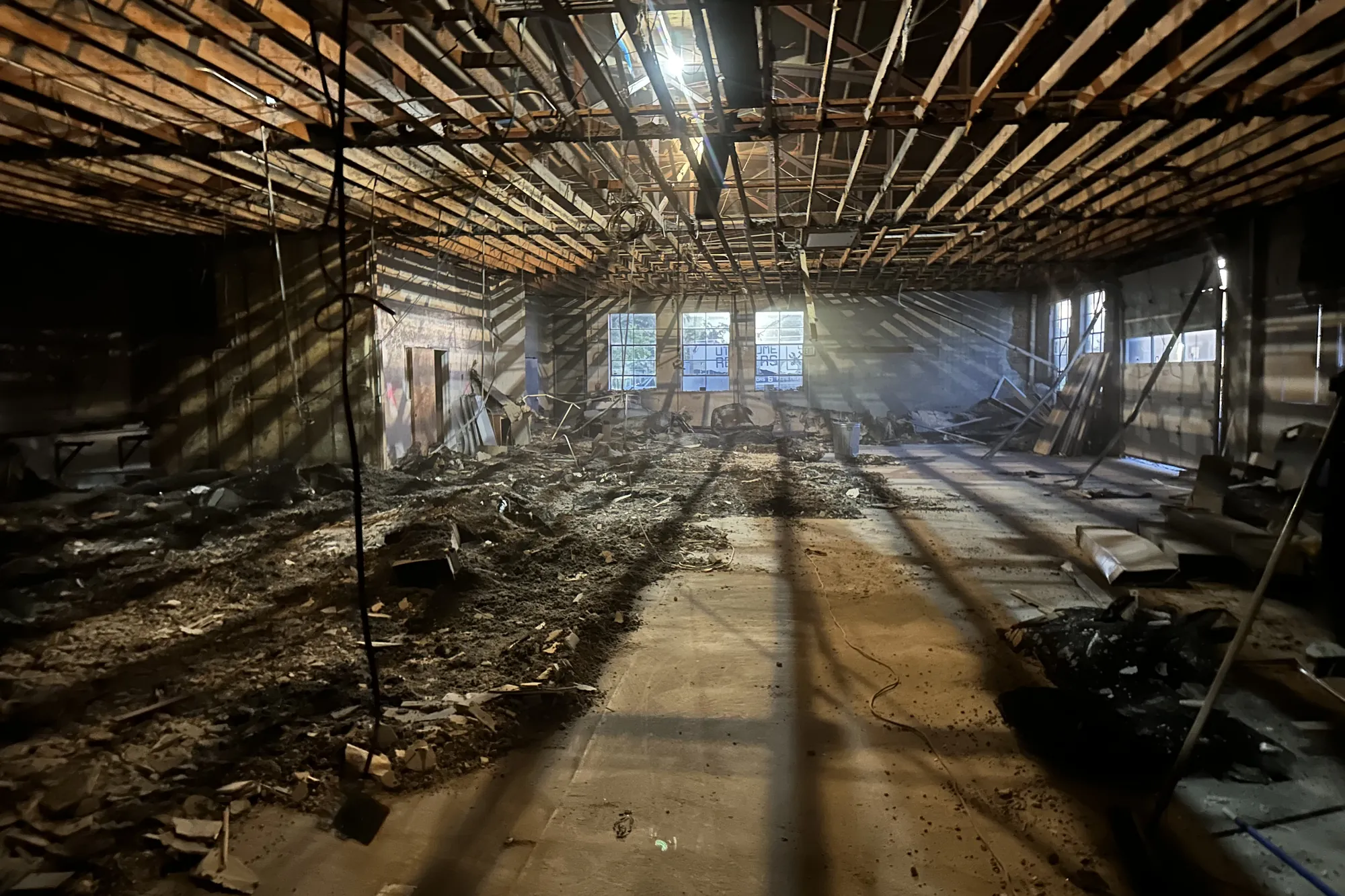 The building before renovation, gutted to the joists